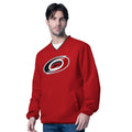 Front: Red v-neck pullover with pouch pocket, Primary logo on chest