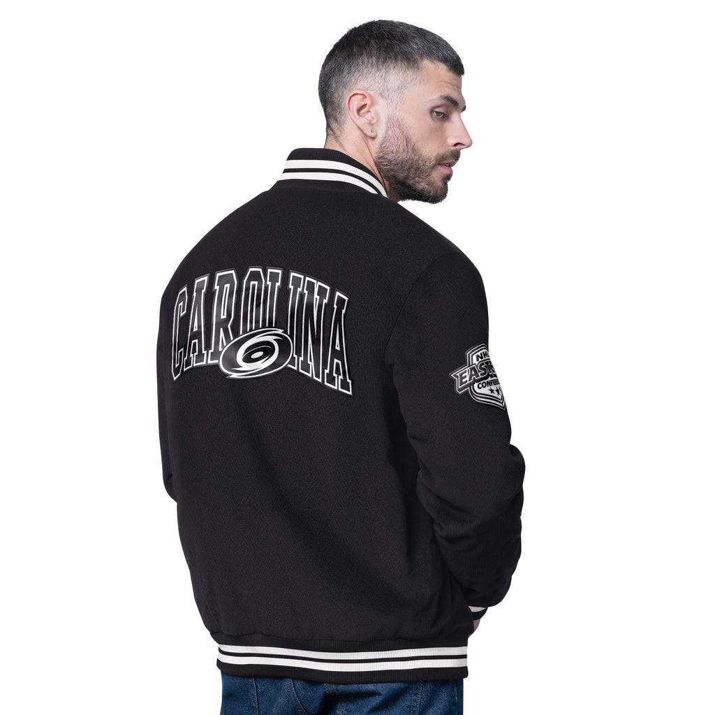Back: "CAROLINA" with Primary logo in black/white, Eastern Conference logo on right sleeve