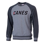 Light gray crewneck with dark gray sleeves, "CANES" wordmark across chest