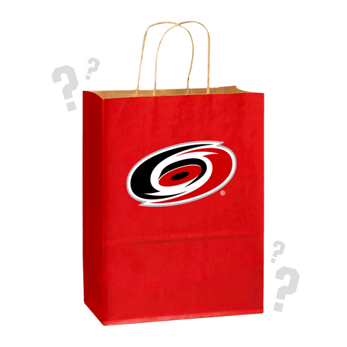 Red bag with Primary logo on front, surrounded by question marks