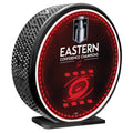 Mega puck with stand, "EASTERN CONFERENCE CHAMPIONS" with Primary logo in red over red background