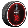 2026 Stanley Cup Final puck featuring Primary logo in red over red/black background