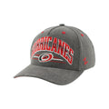 Front Left: Gray hat, red/white/black artwork on front featuring Primary logo
