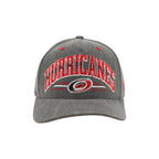 Front: HURRICANES" arched in red/black/white, Primary logo beneath with red/white lines