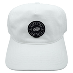 Front: White hat, black circular patch on front- "Carolina Hurricanes" with Primary logo in grey