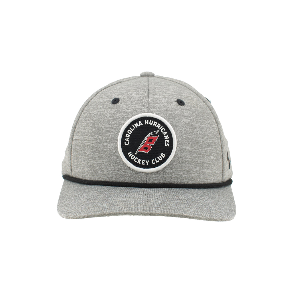 Front: Black circular patch, white outline- Flags logo with "CAROLINA HURRICANES HOCKEY CLUB" around logo