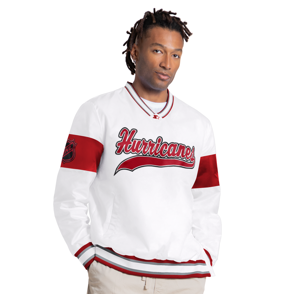 Front: White pullover, red/black/silver accents, "Hurricanes" across chest in baseball-style font