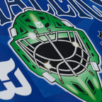 Close up of green goalie mask on front artwork