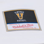 Close up of Mitchell & Ness Vintage Hockey patch at front left waist