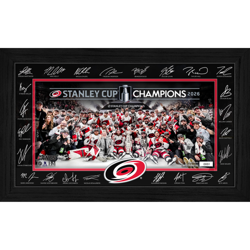 Black-framed Stanley Cup Champions photo with prints of player's autographs