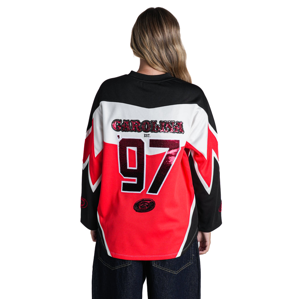 Back: "CAROLINA 97" and Tonal logo on back in red sequin overtop red/white