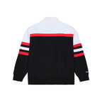 Front: Black quarter zip, red/white stripes, white shoulders,