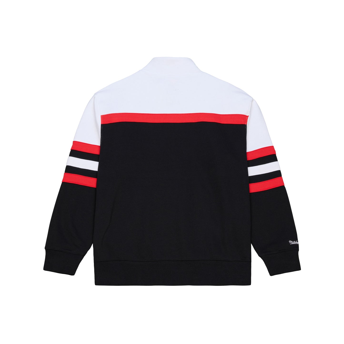 Front: Black quarter zip, red/white stripes, white shoulders,