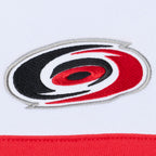 Close up of the Primary logo at the left upper chest