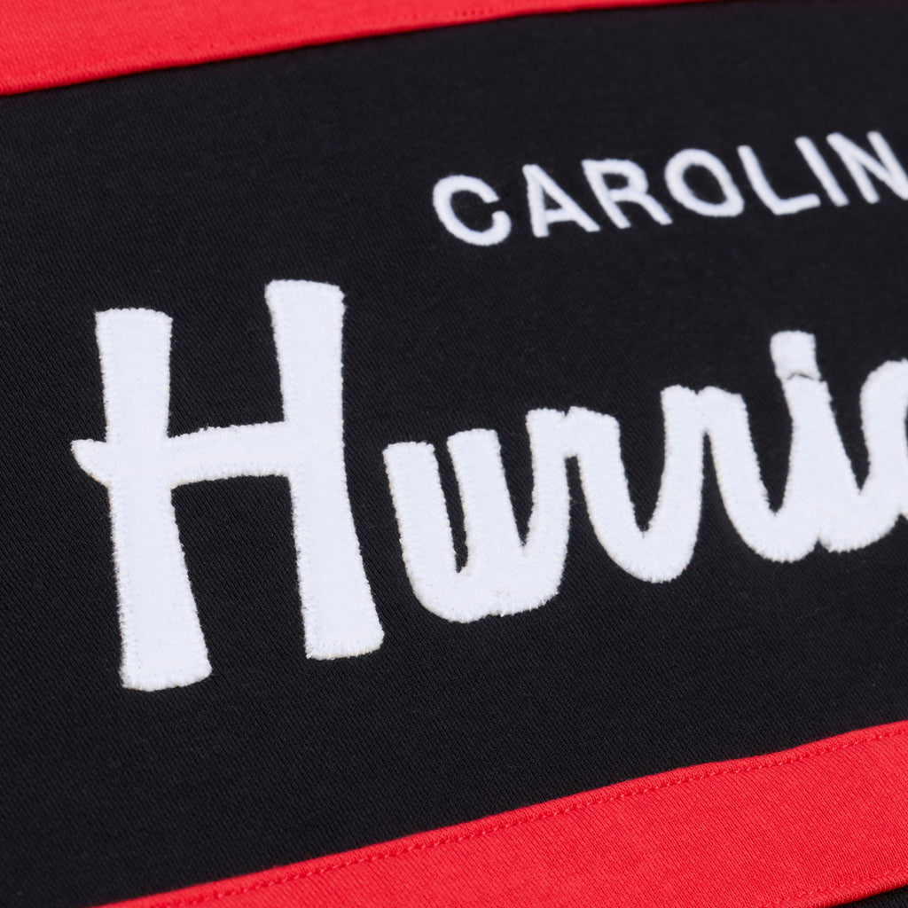 Close up of the "Carolina Hurricanes" wording in white across the front