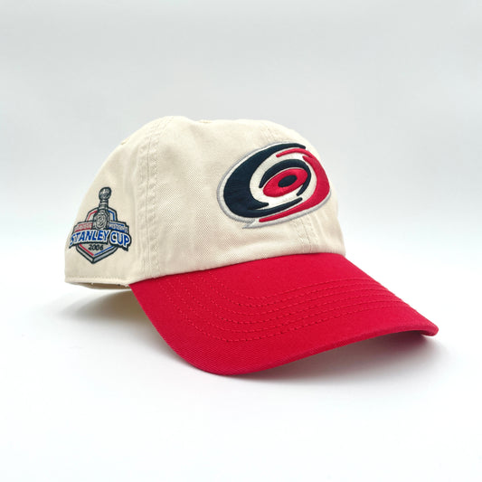 Front: Cream hat with red brim, Primary logo on front, 2006 SCF patch on right