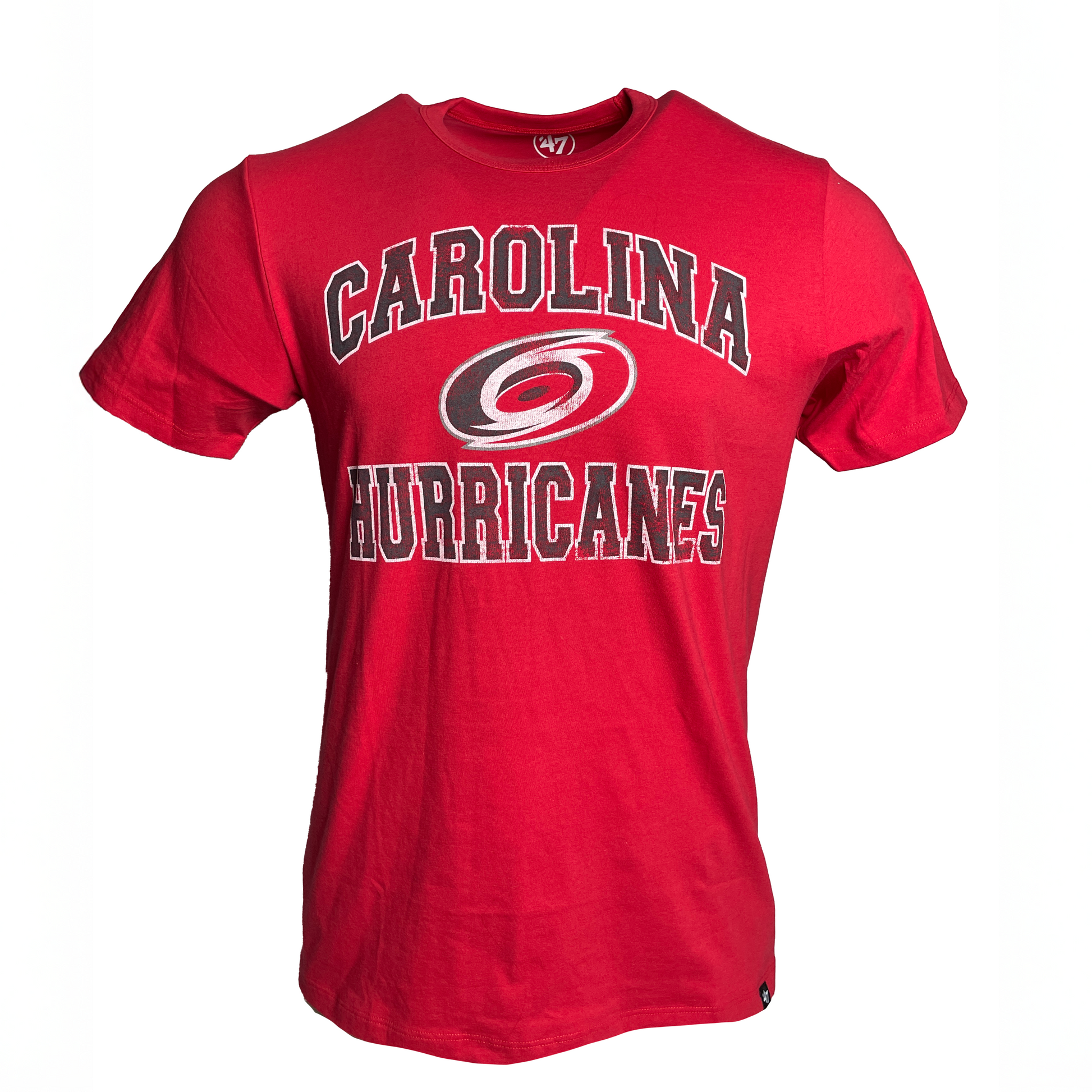 Red tee, says Carolina Hurricanes in black and white arched around our primary logo