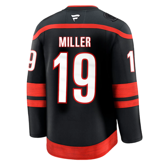 Hurricanes black jersey with "MILLER 19" on back, "19" on both arm sleeves