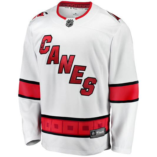 Front: White jersey with black and red striping, Canes diagonally across chest