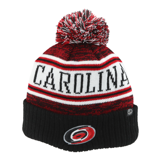 Front: Red white and black pom beanie with Hurricanes logo on cuff and Carolina on front