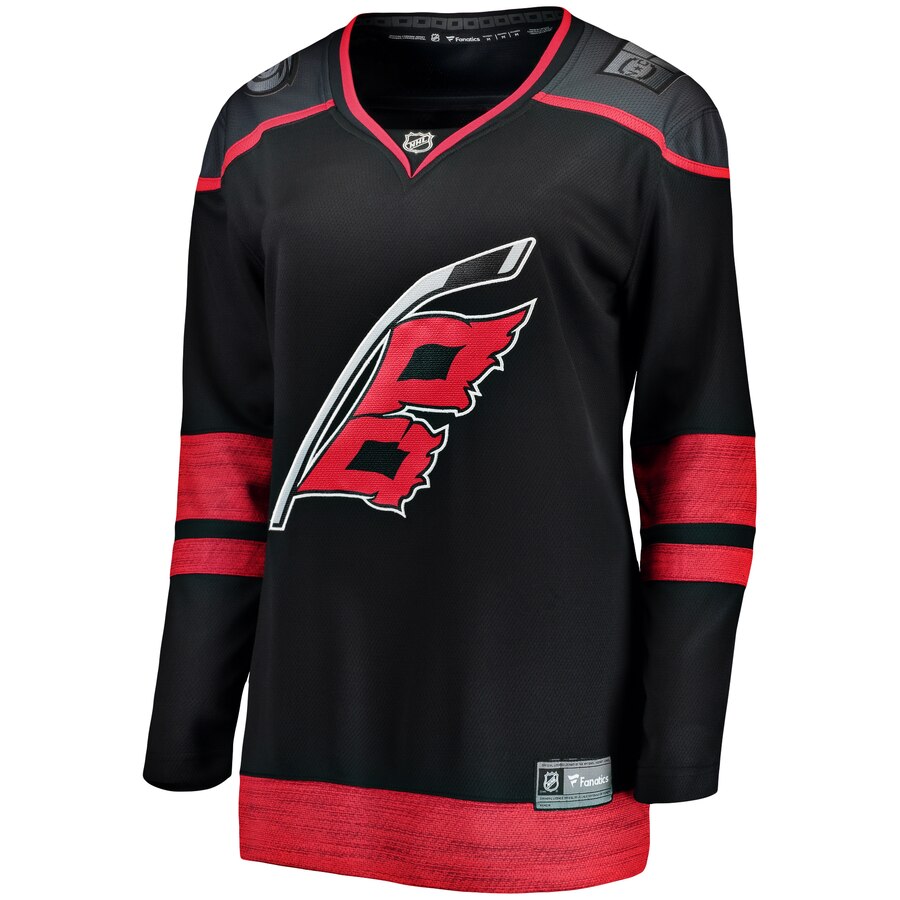 Front: black jersey with dark gray shoulders and red trim, Flags logo on front