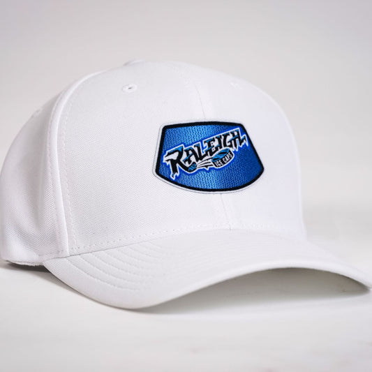 White hat with blue patch in middle featuring Raleigh IceCaps wordmark logo