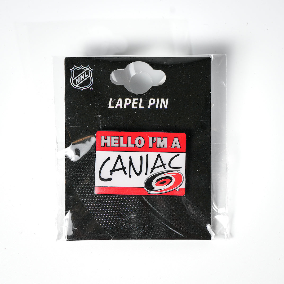 Pin with nametag design that says "Hello I'm A Caniac"