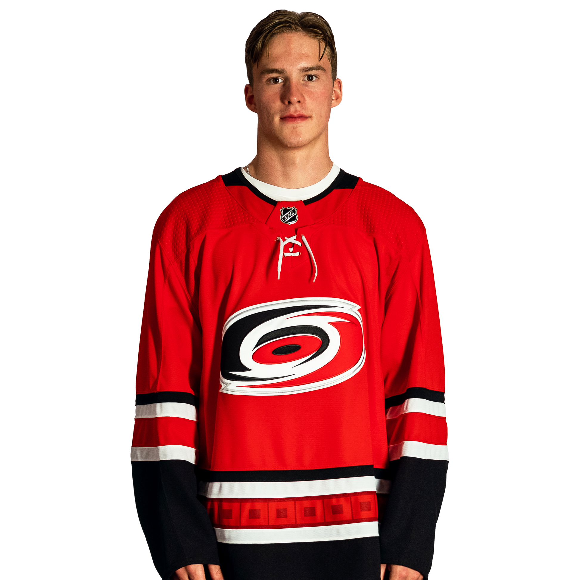 Andrei Svechnikov wearing the red jersey.
