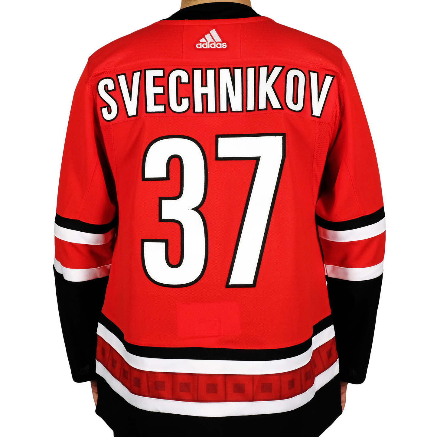 Back View: Hurricanes Red Adidas Jersey with Svechnikov 37 on back.
