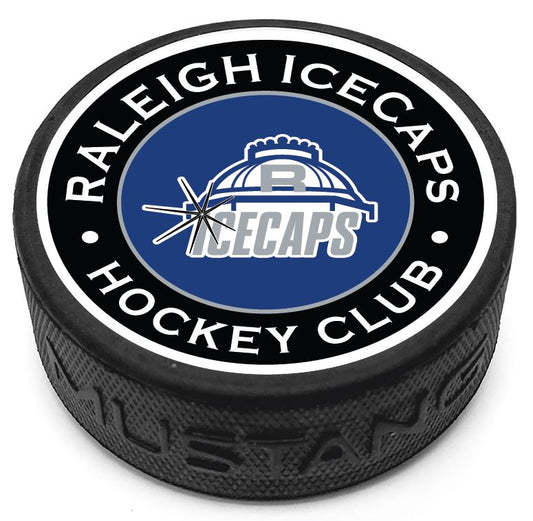 Hockey puck with the Raleigh IceCaps logo in the center and "Raleigh IceCaps Hockey Club" on the outside of a blue and black top face.
