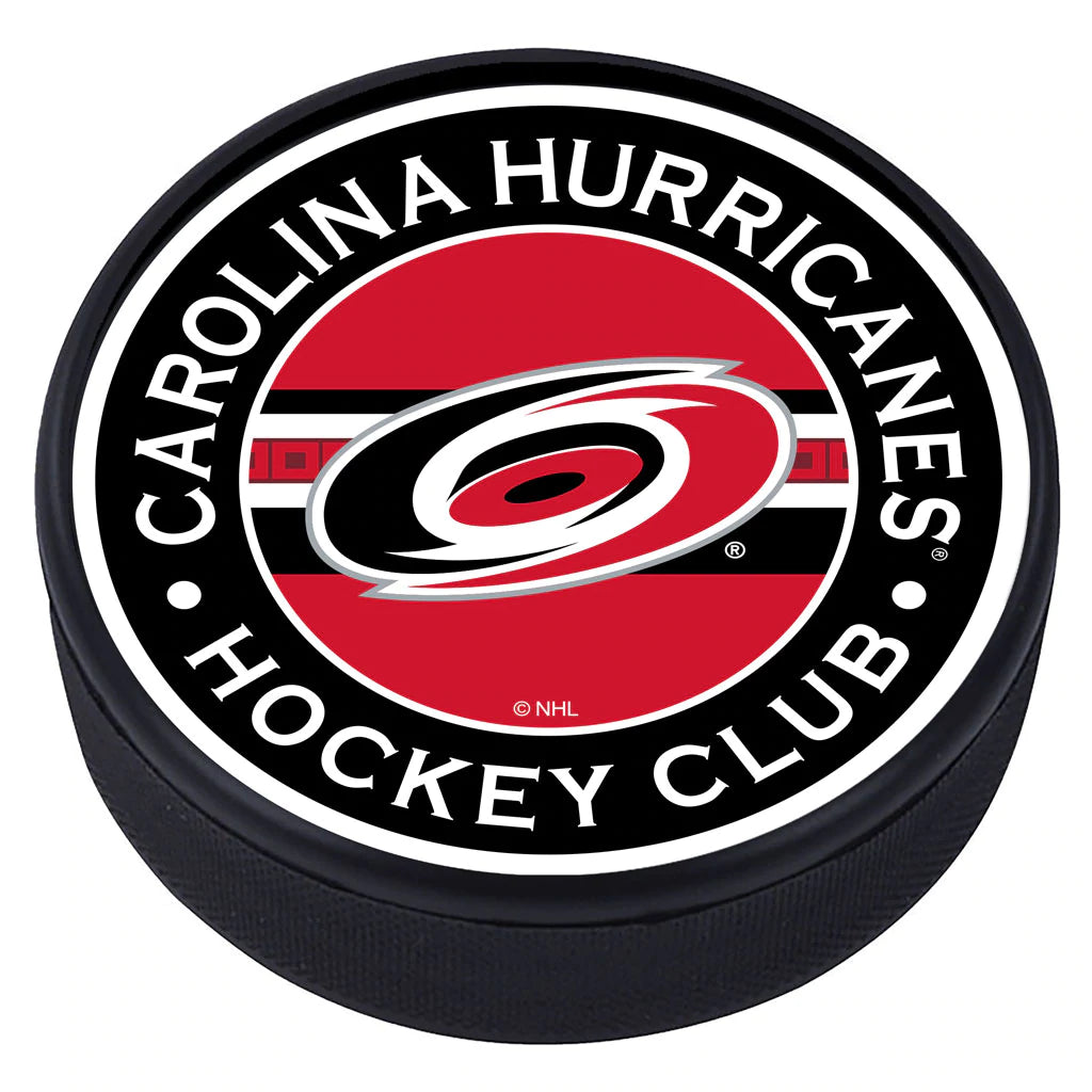 Hockey puck in Mustang's "Stripe" style with the Hurricanes primary logo and their signature flag striping in the center with the phrase "Carolina Hurricanes Hockey Club" on the outside of the top face.