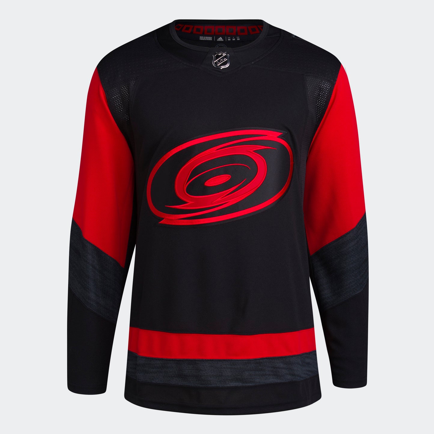 Front View: Stadium Series Black and red jersey with black and red Hurricanes logo